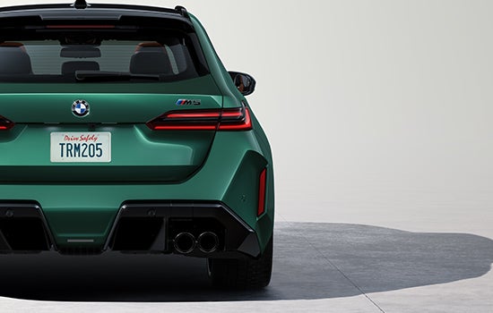 Rear shot of BMW M5 Touring showing the flared wheel arches. | BMW of Devon in Devon PA